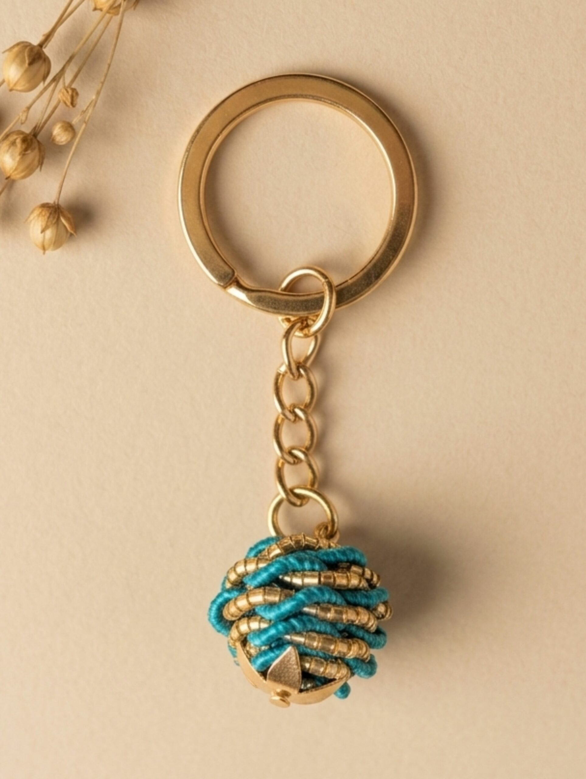 Llavero de oro vegetal de Capim Dourado | SLOWECO