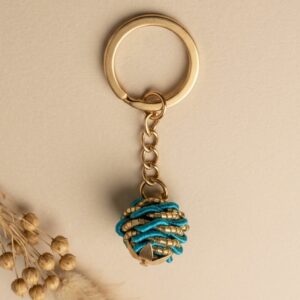 Llavero de oro vegetal de Capim Dourado | SLOWECO